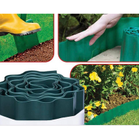 Влаштування бордюру з кромкової стрічки по краю газону, клумби, ціна за м/п купить